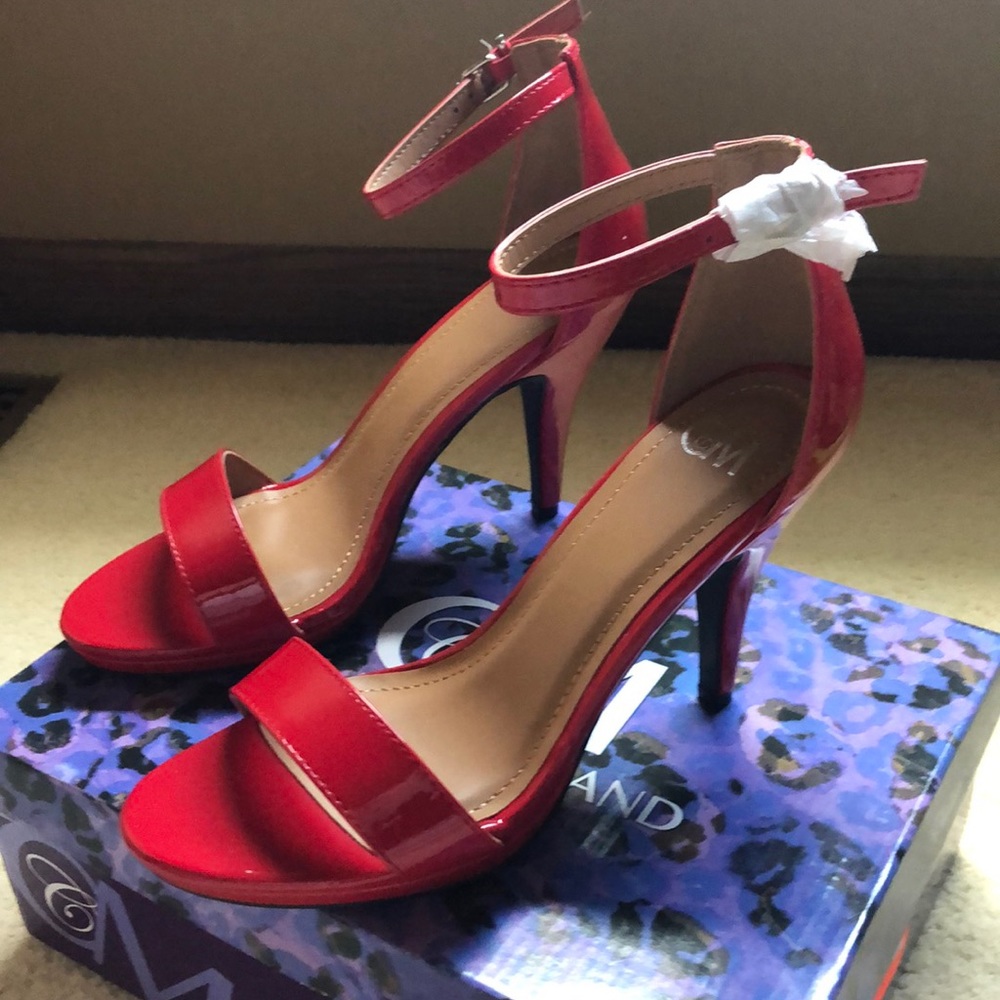 Red patent sandals.